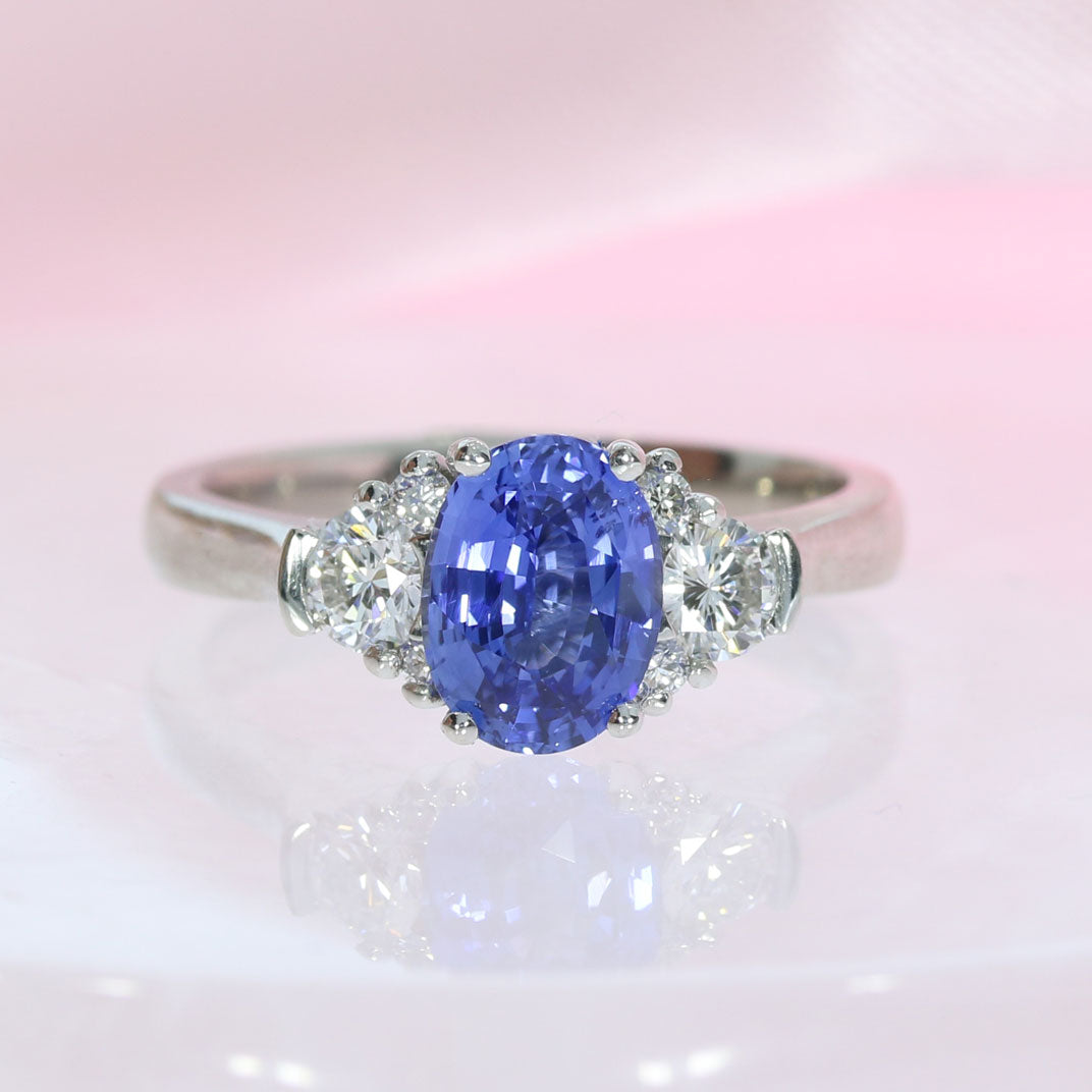 Platinum Oval Sapphire & Diamond Claw Set Ring Sapphire: 1.60ct Diamond: 0.38ct