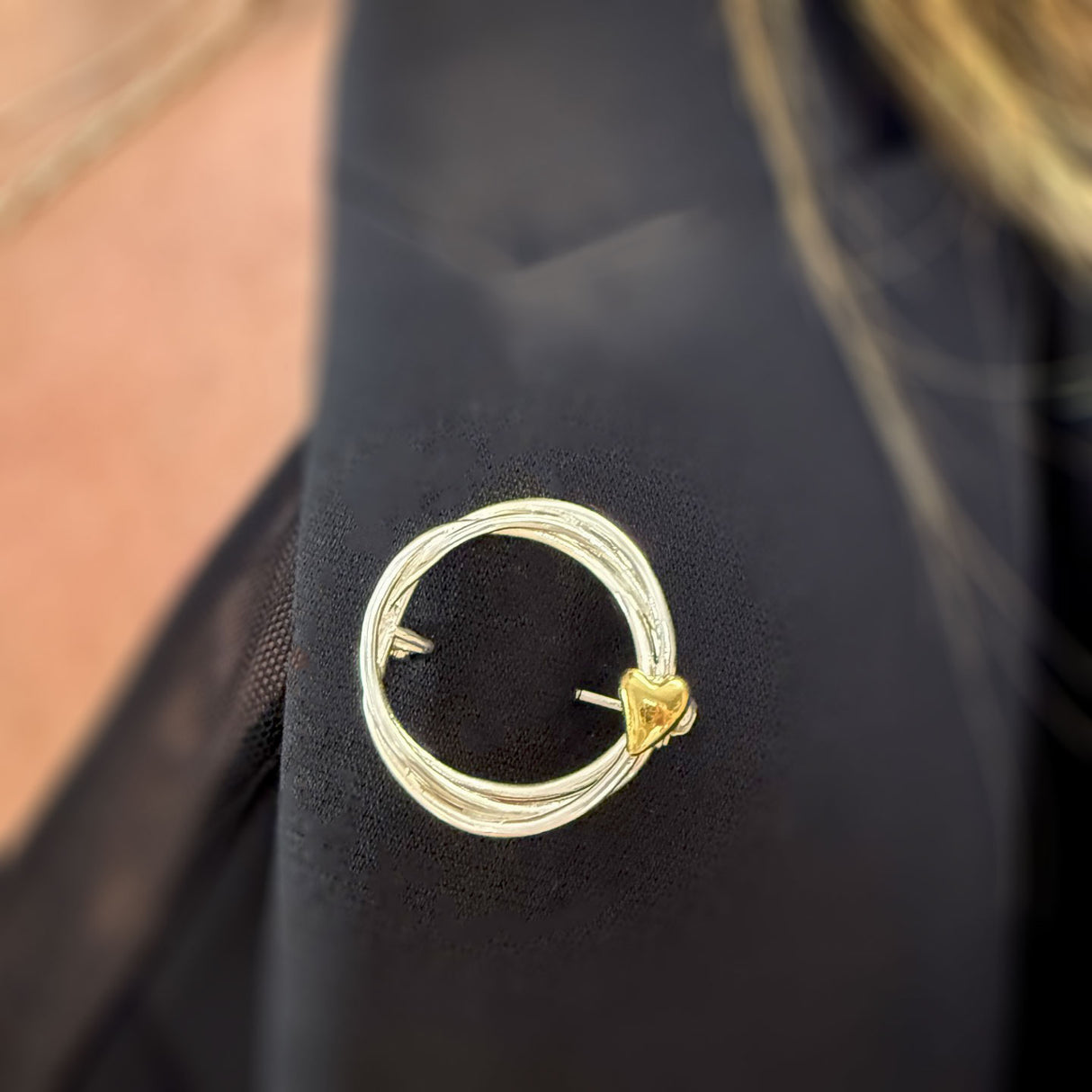Silver Twisted Circle Brooch with Gold Plated Heart Detail