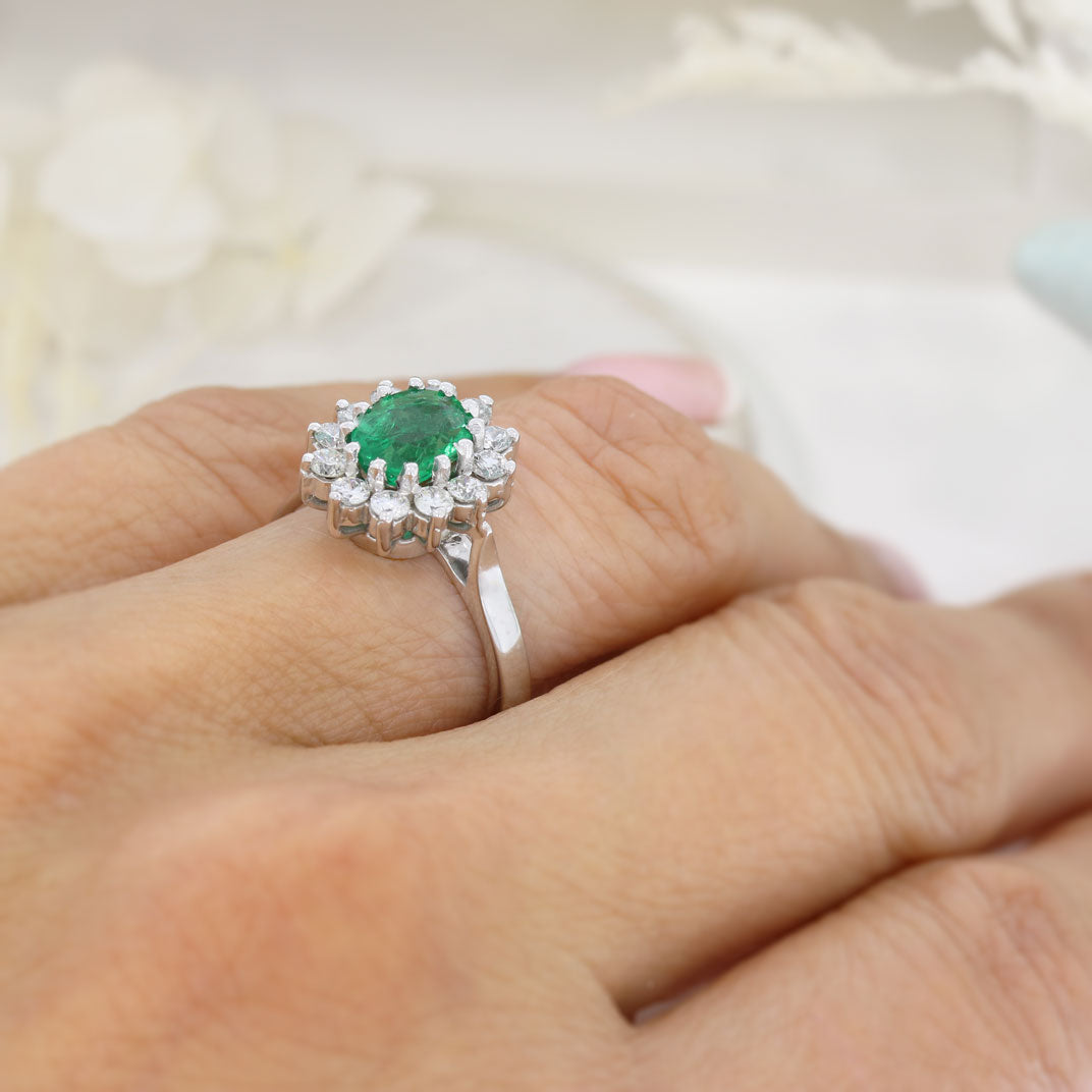 18ct White Gold Oval Claw Set Emerald & Diamond Cluster Ring