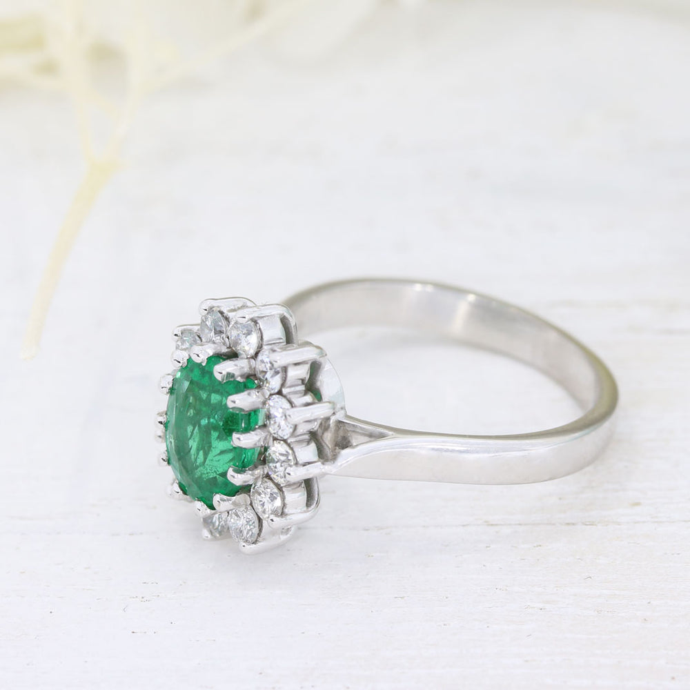 18ct White Gold Oval Claw Set Emerald & Diamond Cluster Ring