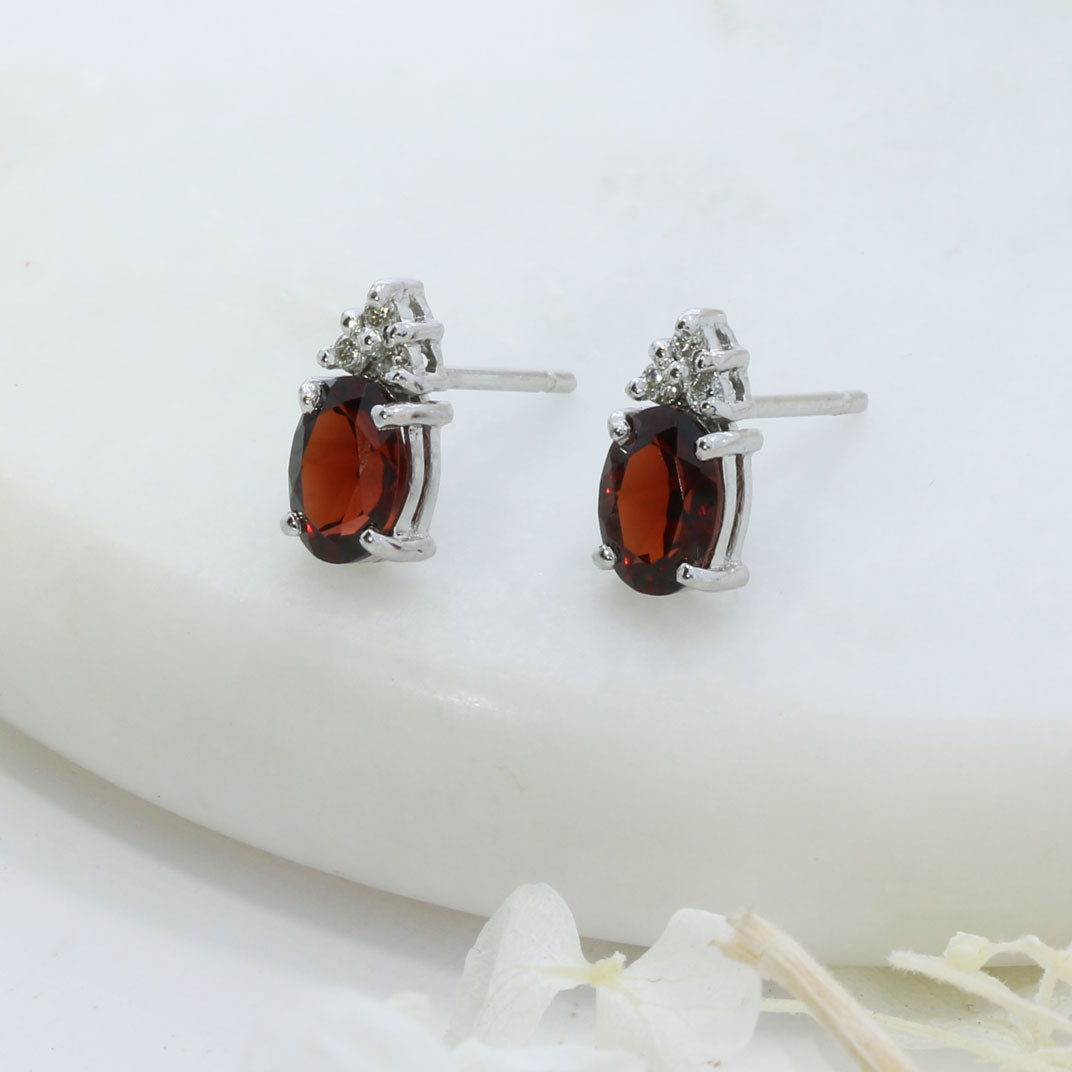 Pre Owned 18ct White Gold Garnet & Diamonds Stud Earrings