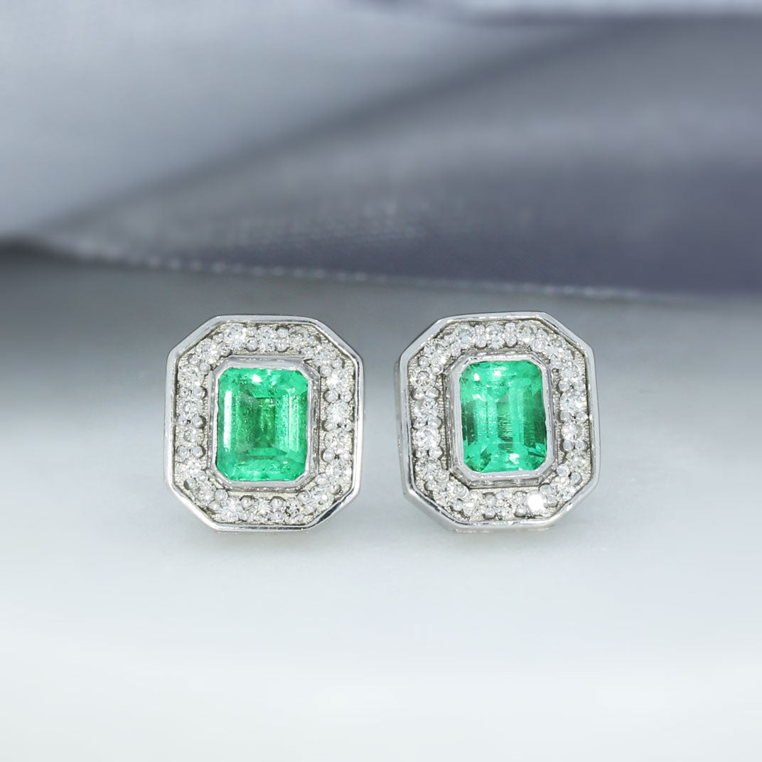 18ct White Gold Oblong Emerald Earrings with Pave Diamond Halo