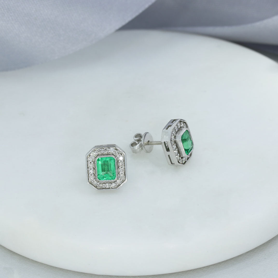 18ct White Gold Oblong Emerald Earrings with Pave Diamond Halo