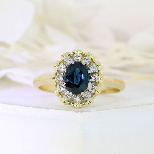 Pre Owned 18ct Gold Oval Claw Set Sapphire & Diamond Cluster Ring
