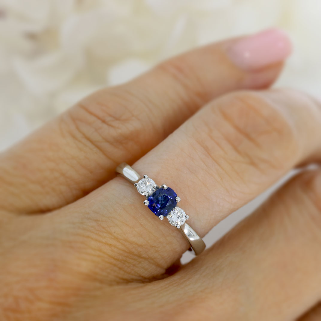 Platinum Cushion Shape Sapphire & Round Diamond 3 Stone Ring