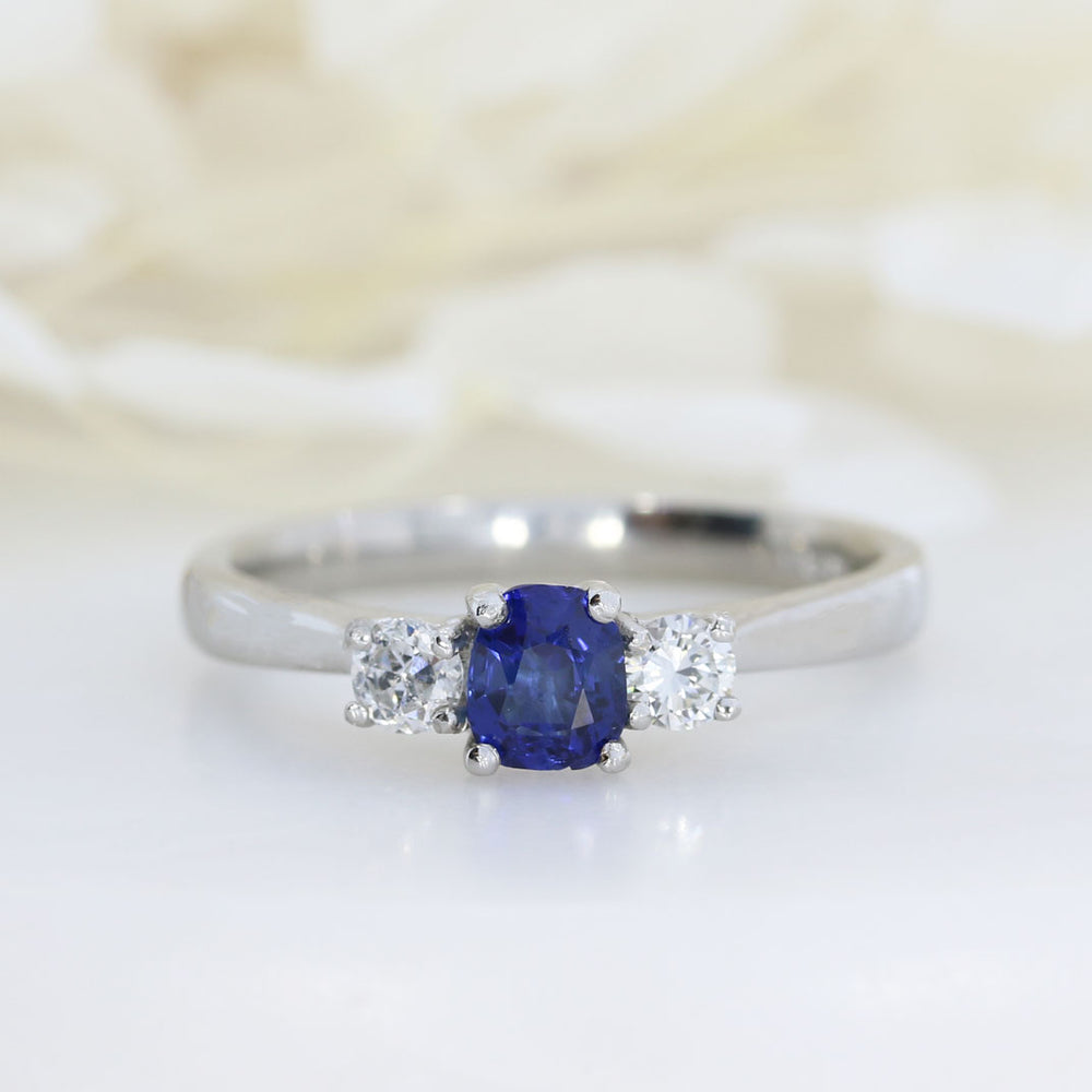 Platinum Cushion Shape Sapphire & Round Diamond 3 Stone Ring