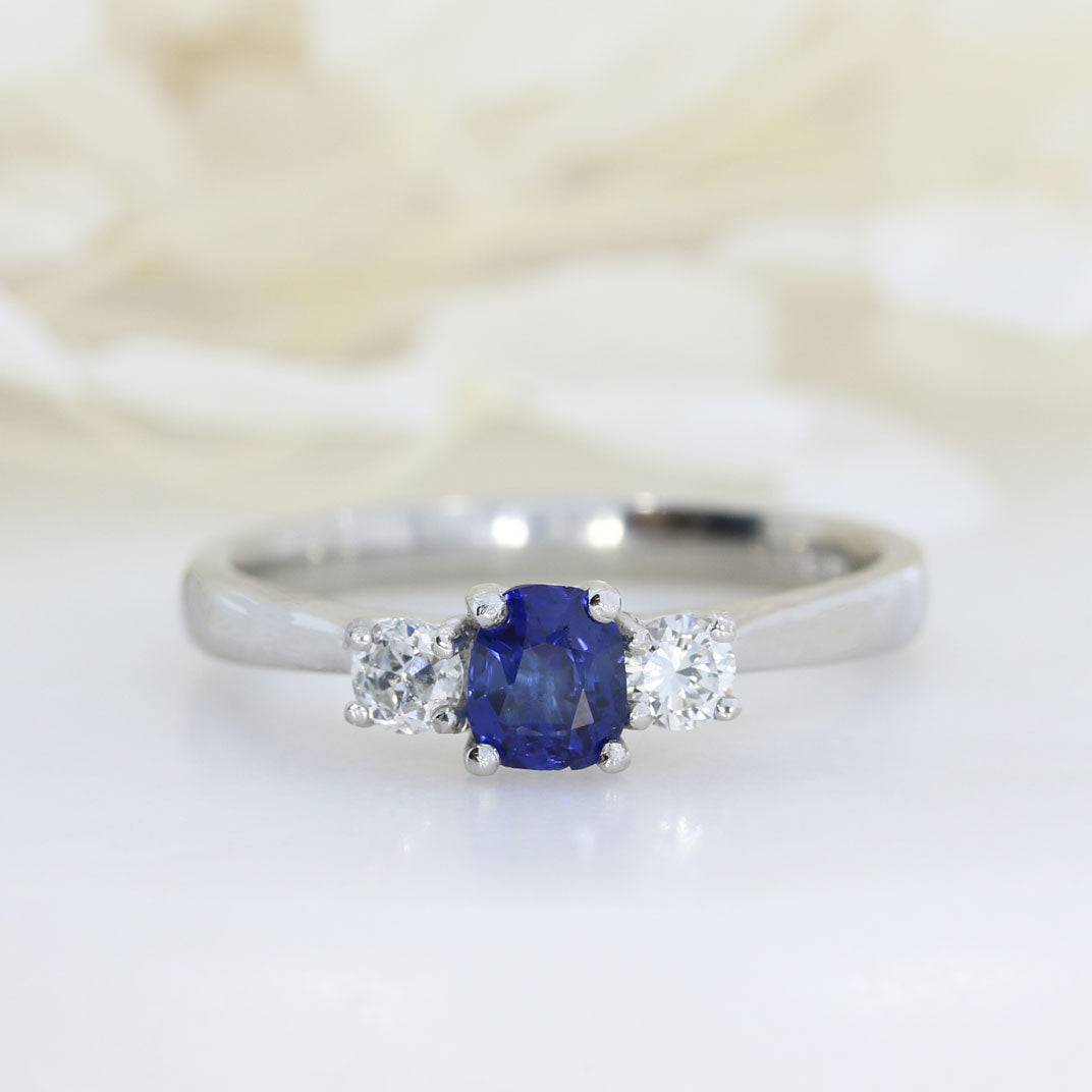 Platinum Cushion Shape Sapphire & Round Diamond 3 Stone Ring
