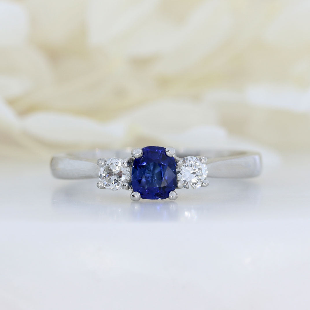 Platinum Cushion Shape Sapphire & Round Diamond 3 Stone Ring