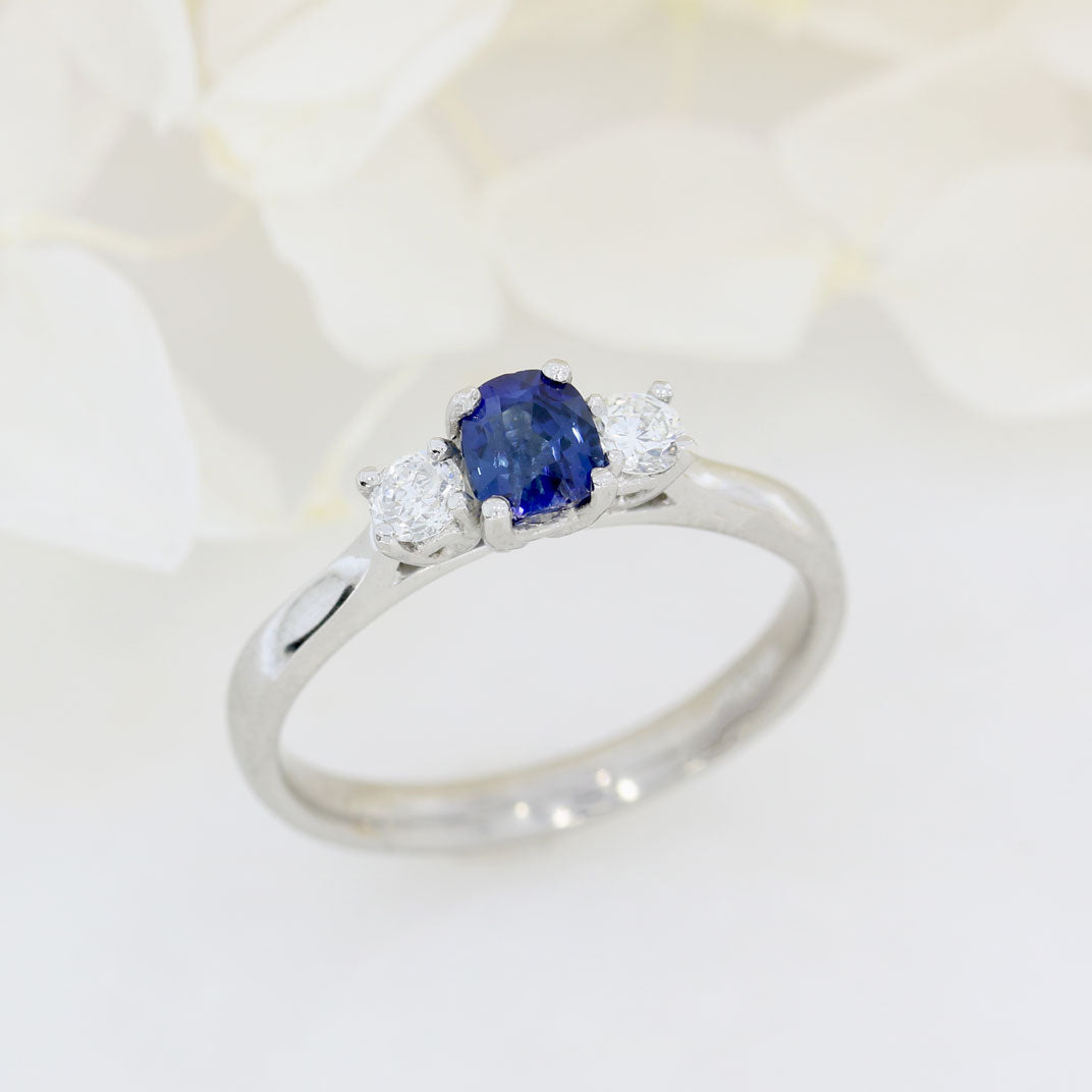 Platinum Cushion Shape Sapphire & Round Diamond 3 Stone Ring