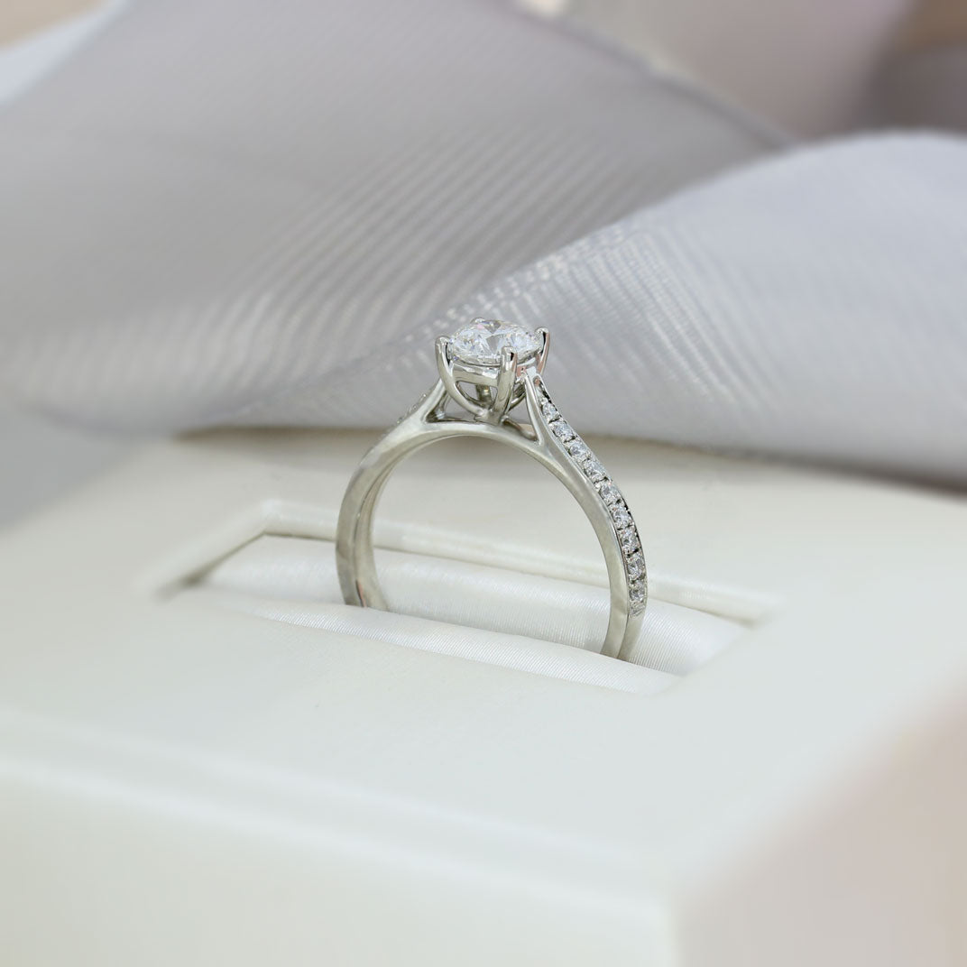 Pre Owned Platinum GIA Certified Diamond Solitaire Ring with Pave Set Shoulders 0.55ct