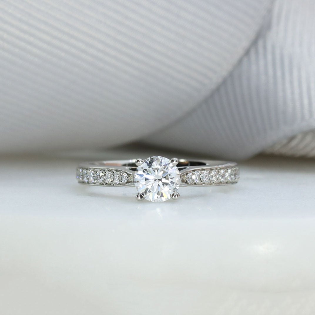 Pre Owned Platinum GIA Certified Diamond Solitaire Ring with Pave Set Shoulders 0.55ct