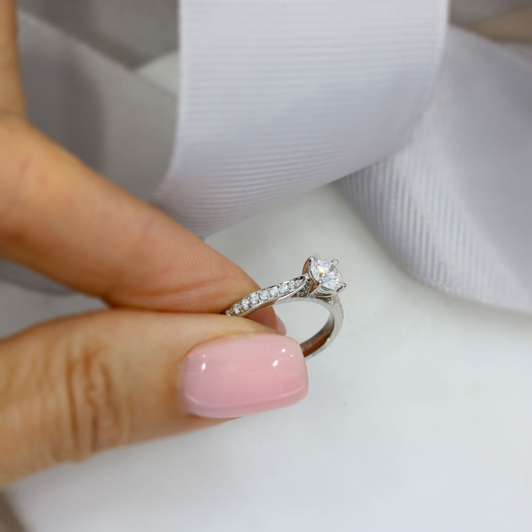 Pre Owned Platinum GIA Certified Diamond Solitaire Ring with Pave Set Shoulders 0.55ct