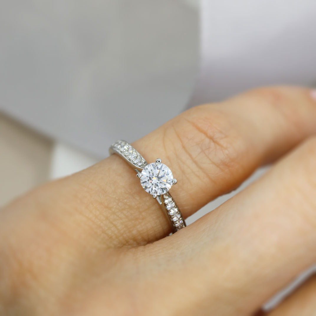 Pre Owned Platinum GIA Certified Diamond Solitaire Ring with Pave Set Shoulders 0.55ct