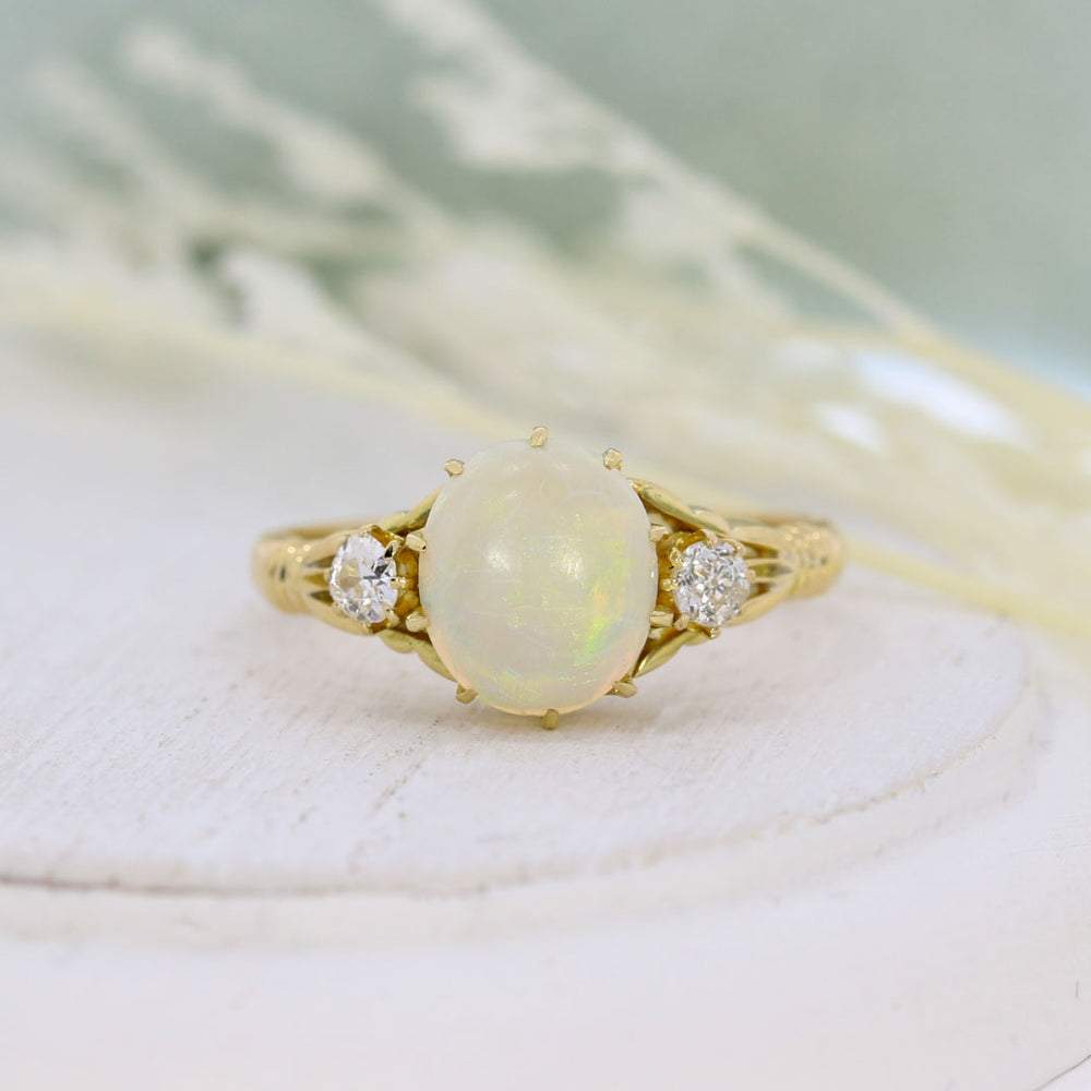Pre Owned 18ct Yellow Gold Oval Opal & Round Diamond Ring