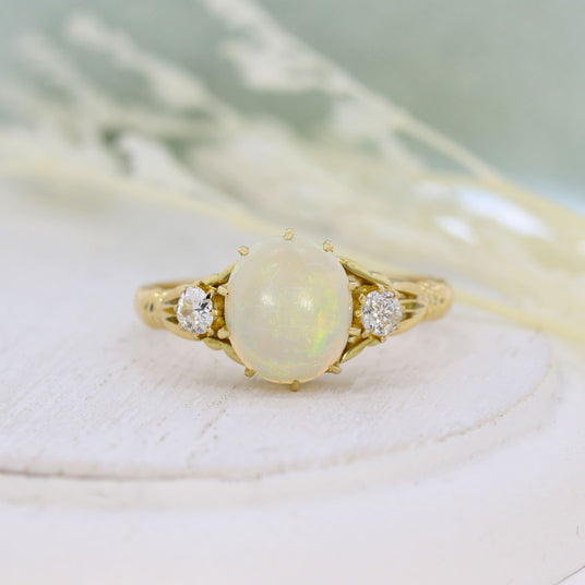 Pre Owned 18ct Yellow Gold Oval Opal & Round Diamond Ring