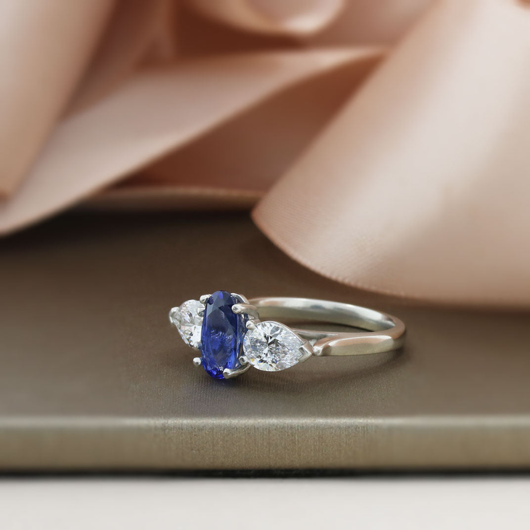 Platinum Sapphire 1.48ct & Pear Shape Lab Grown Diamond 1.30ct 3 Stone Ring