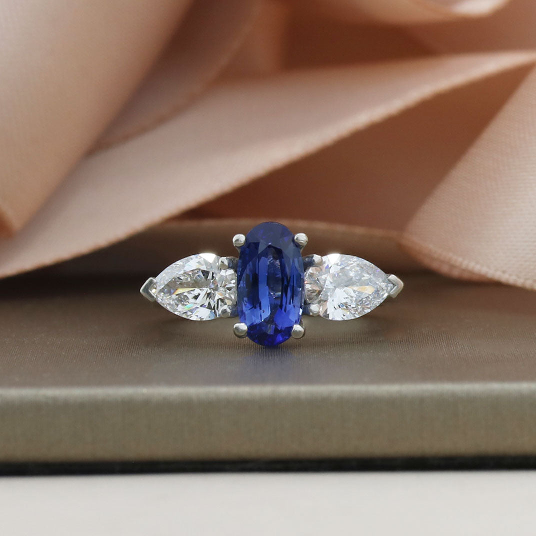 Platinum Sapphire 1.48ct & Pear Shape Lab Grown Diamond 1.30ct 3 Stone Ring