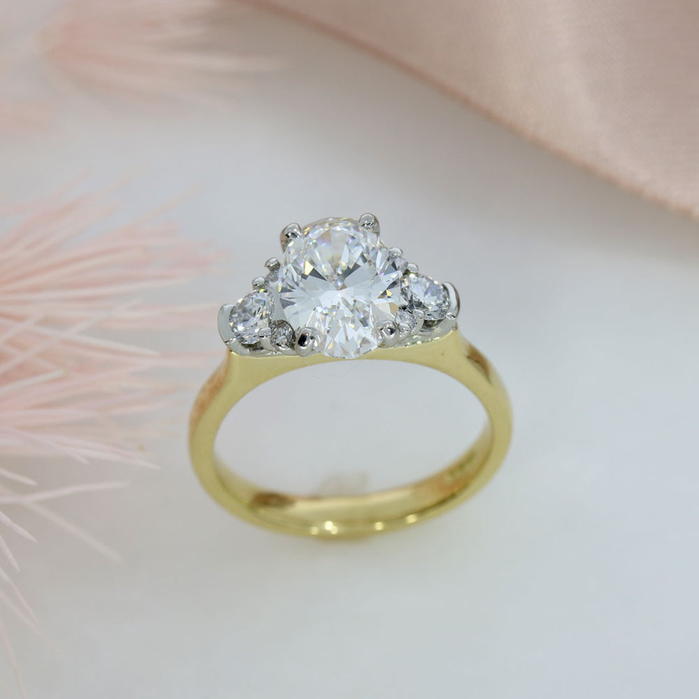 18ct Certified Oval Brilliant Cut Lab Grown Diamond with Stone Set Shoulders Total 2.29ct E VS1
