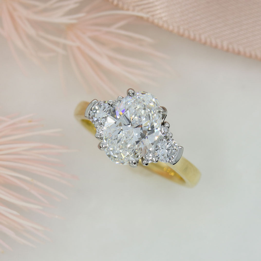 18ct Certified Oval Brilliant Cut Lab Grown Diamond with Stone Set Shoulders Total 2.29ct E VS1