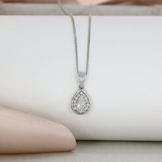 18ct White Gold Pear Shaped Diamond Halo Pendant on an 18ct 18inch White Gold Chain