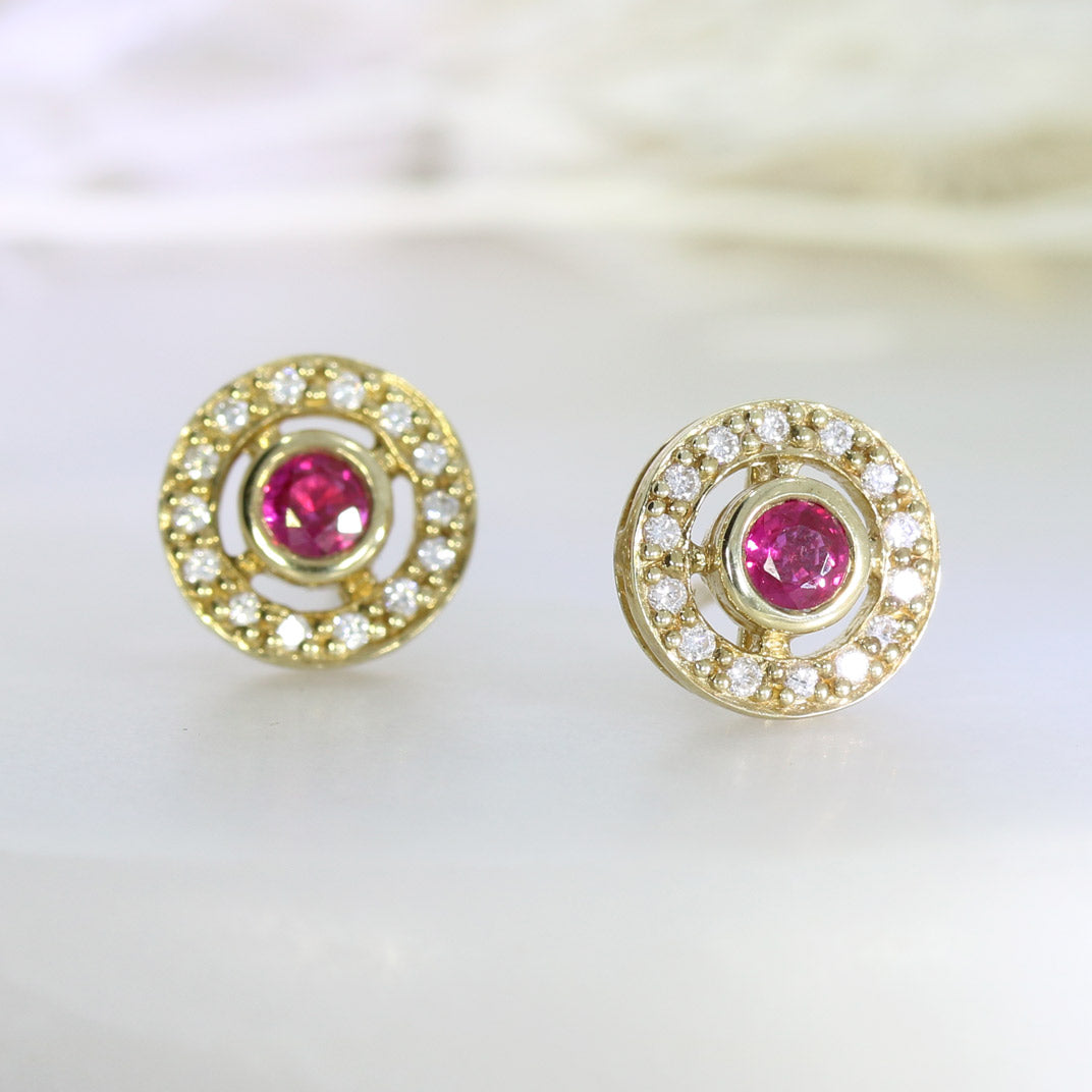 9ct Yellow Gold Ruby Stud Earrings with a Diamond Halo Surround