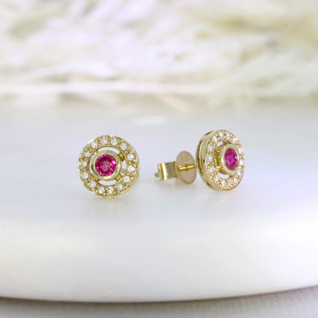 9ct Yellow Gold Ruby Stud Earrings with a Diamond Halo Surround