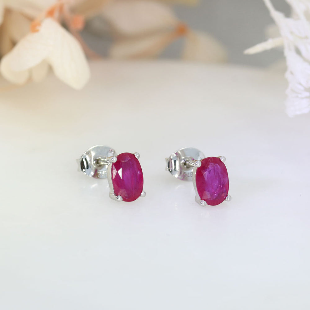 9ct White Gold 4 Claw Set Oval Ruby Stud Earrings