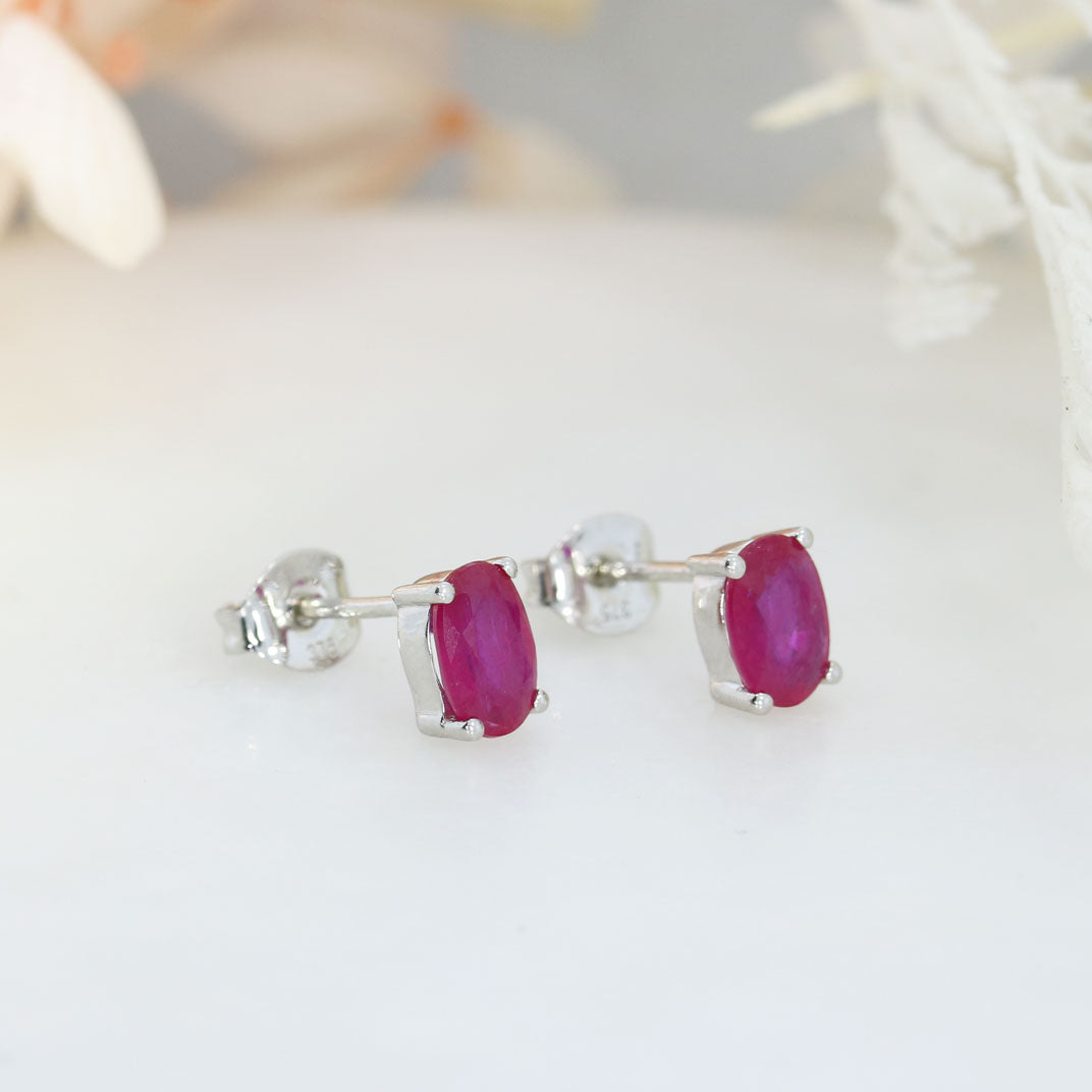 9ct White Gold 4 Claw Set Oval Ruby Stud Earrings