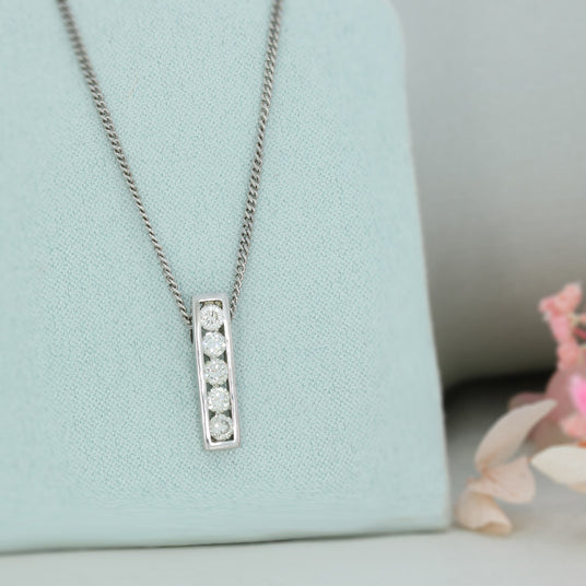 18ct White Gold 5 Stone Channel Set Diamond Pendant on 18ct Gold Chain