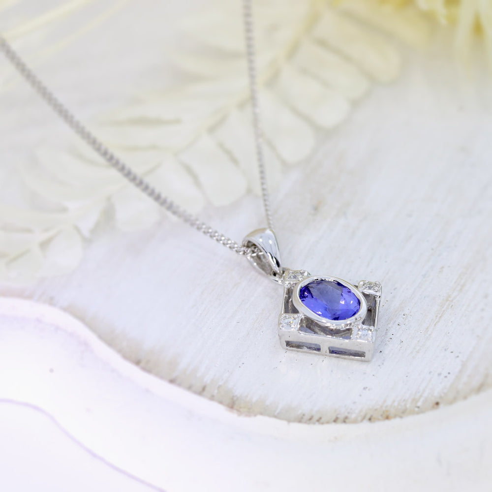 9ct White Gold Tanzanite & Diamond Pendant on a 9ct 16Inch Chain