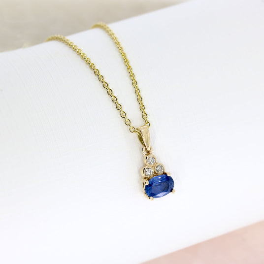 9ct Yellow Gold Oval Sapphire & Diamond Pendant on 18inch 9ct Yellow Chain