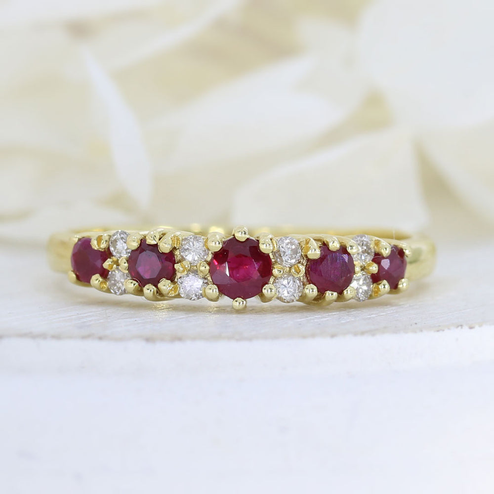 18ct Yellow Gold Ruby & Diamond Claw Set Eternity ring.