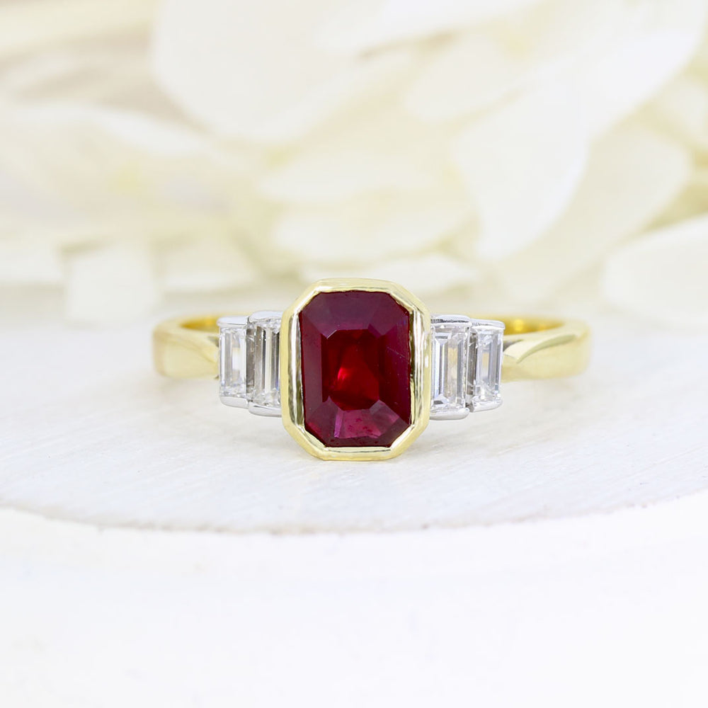 18ct Yellow Gold Rub Over Set Emerald Cut Ruby and 4 Baguette Diamond Ring