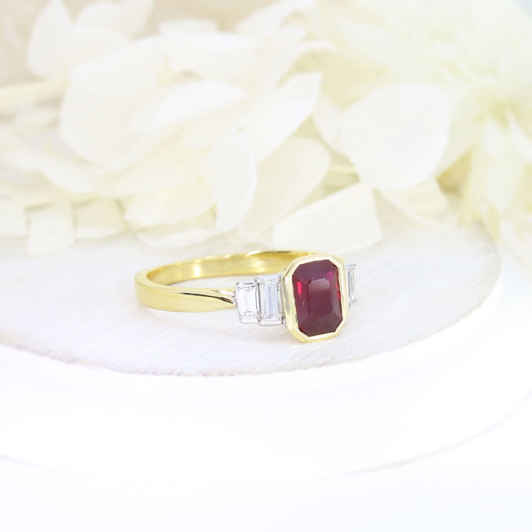 18ct Yellow Gold Rub Over Set Emerald Cut Ruby and 4 Baguette Diamond Ring