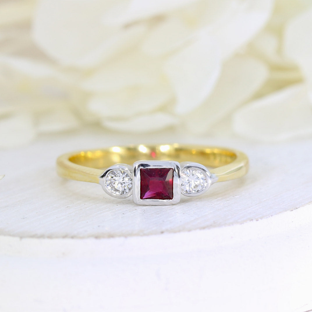 18ct Yellow Gold Ruby & Diamond 3 Stone Ring in a Rub Over Setting.