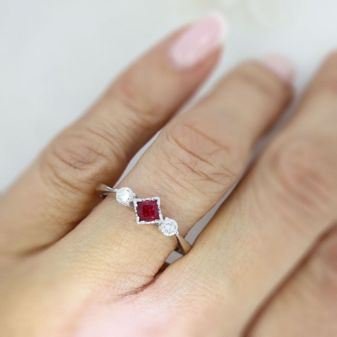 18ct White Gold Princess Cut Ruby & Diamond Three Stone Ring.