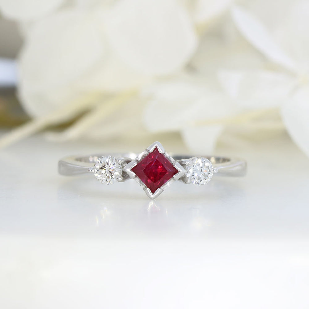 18ct White Gold Princess Cut Ruby & Diamond Three Stone Ring.