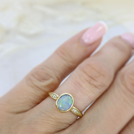 18ct Yellow Gold Oval Rubover Set Opal Dress Ring with Pave Set Diamond Shoulders