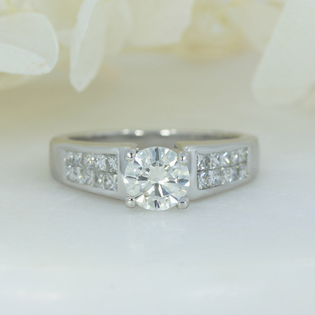 Pre Owned 18ct Brilliant Cut Diamond Solitaire Ring with Princess Cut Diamond Shoulders Total 1.30ct