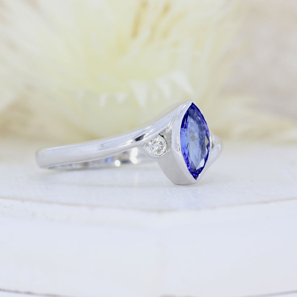 9ct White Gold Rubover Set Marquise Shape Tanzanite & Diamond Ring