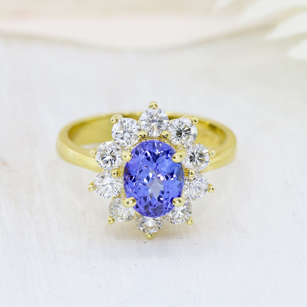 18ct Yellow Gold 1.80ct Oval Tanzanite & Diamond Cluster Ring