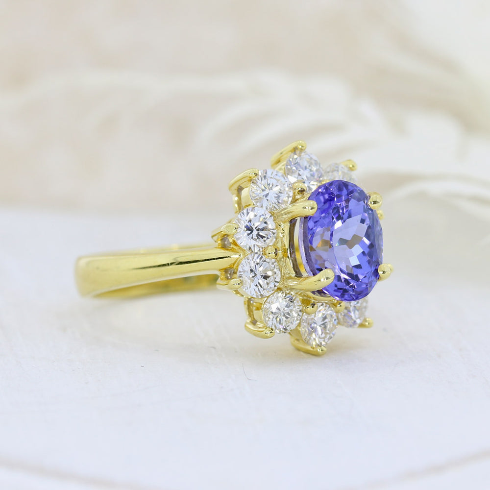 18ct Yellow Gold 1.80ct Oval Tanzanite & Diamond Cluster Ring