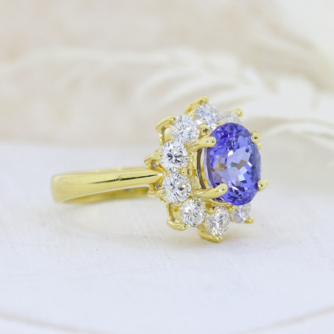 18ct Yellow Gold 1.80ct Oval Tanzanite & Diamond Cluster Ring