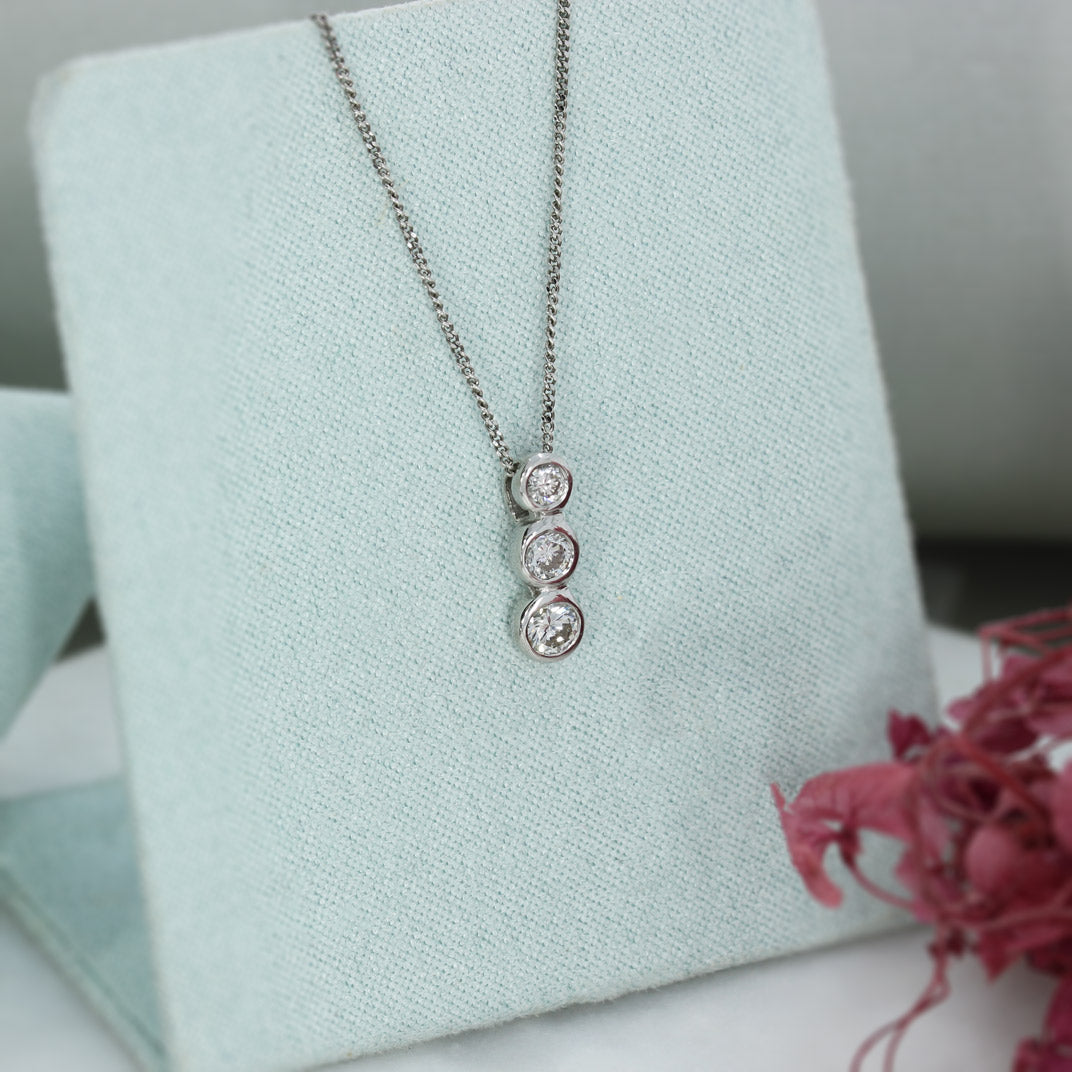 18ct White Gold 3 Stone Diamond Pendant on an 18ct White Gold Chain