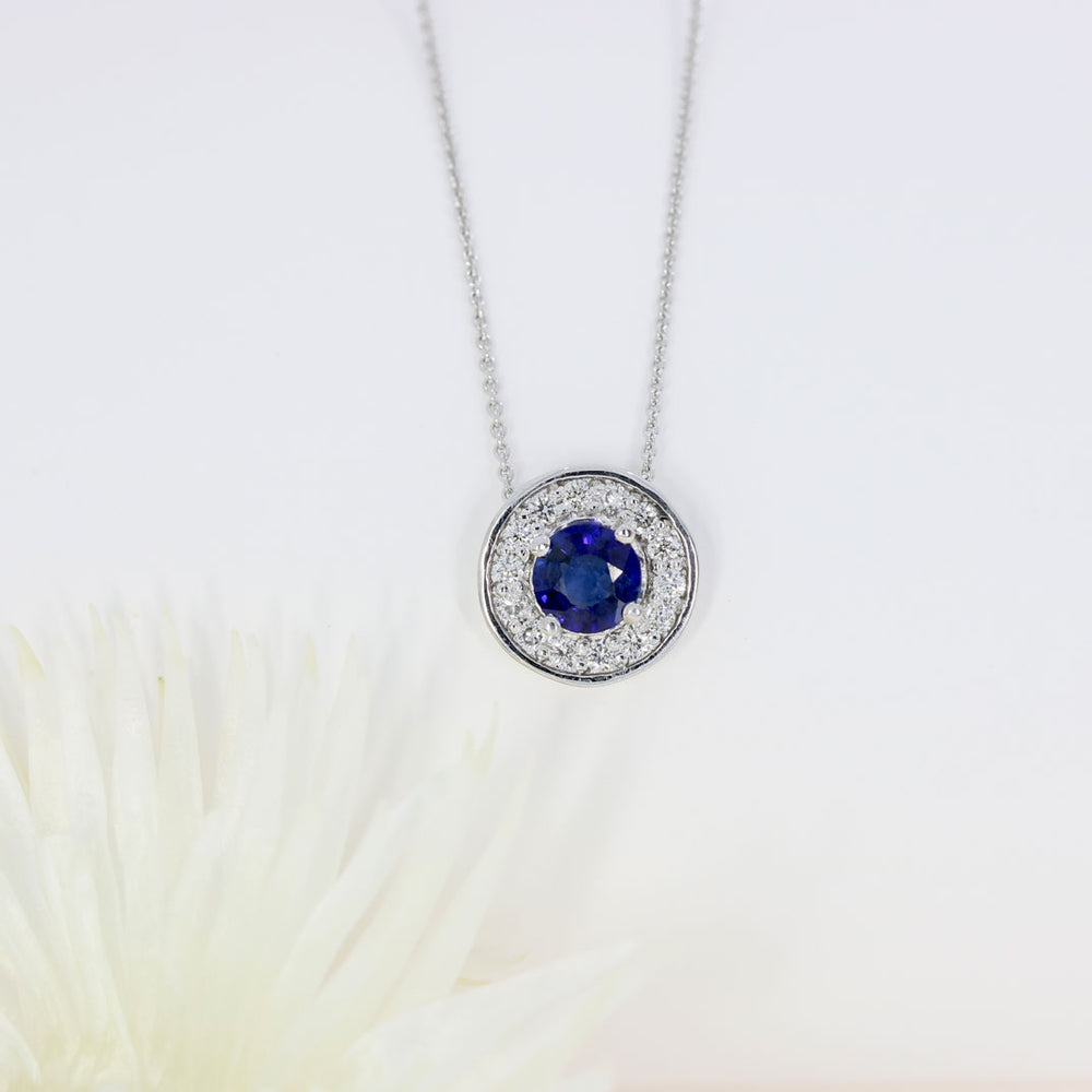 18ct White Gold Round Sapphire and Diamond Cluster Halo Pendant On a 18ct 18" Chain