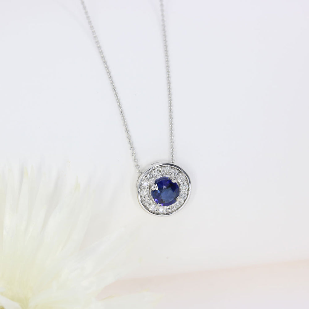 18ct White Gold Round Sapphire and Diamond Cluster Halo Pendant On a 18ct 18" Chain