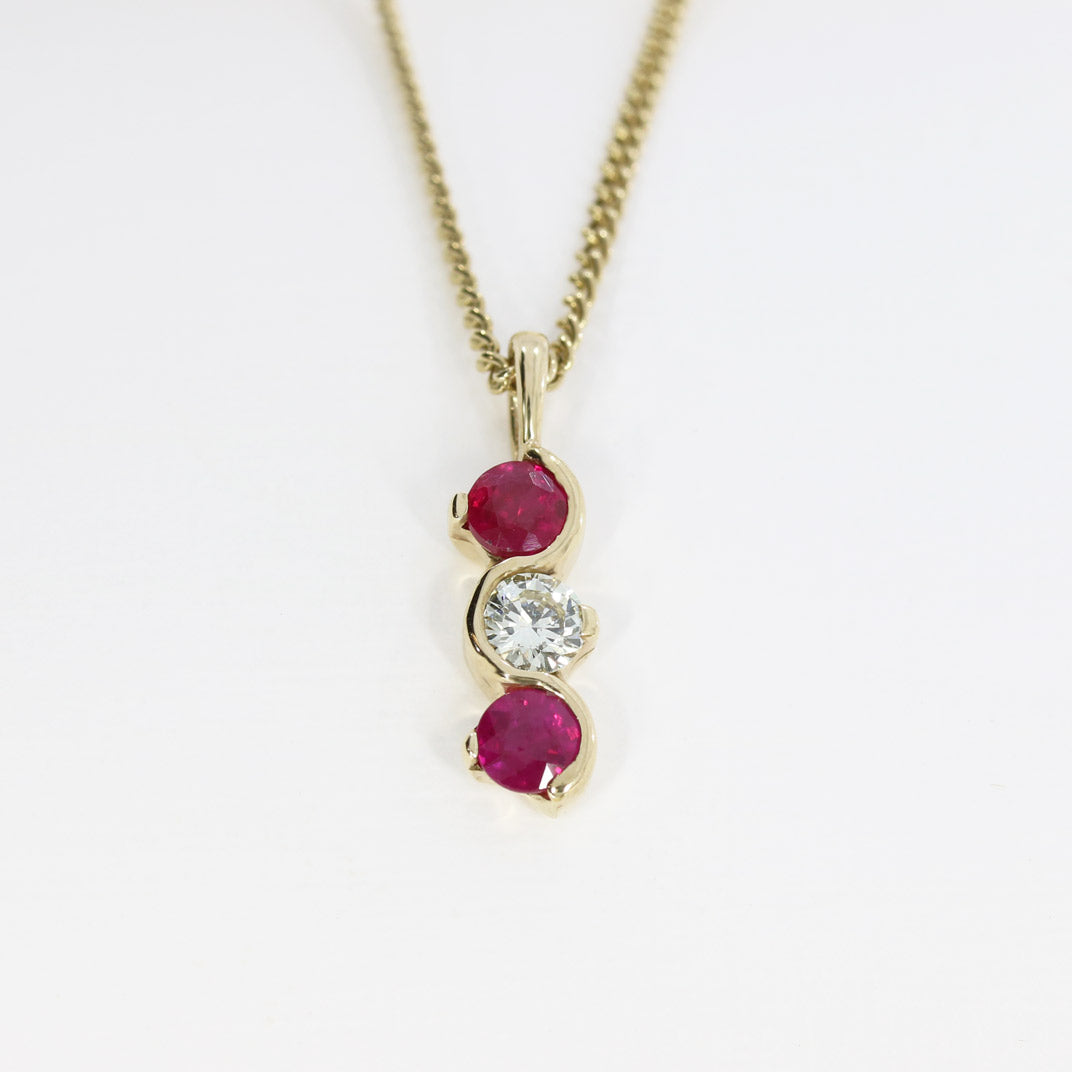 9ct Yellow Gold Ruby and Diamond Wave Style 3 Stone Pendant on a 9ct Yellow Gold 19" Chain