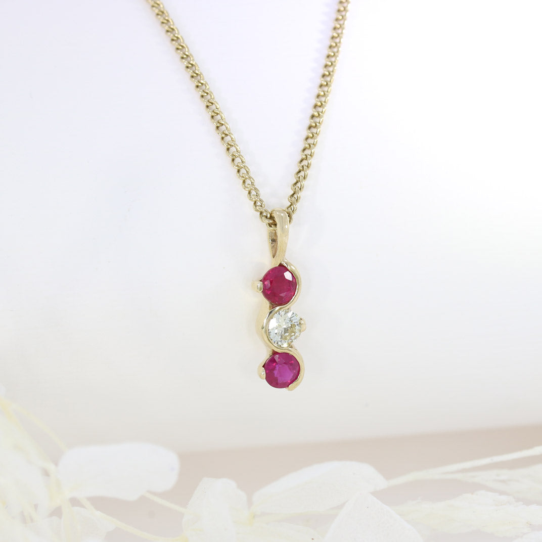 9ct Yellow Gold Ruby and Diamond Wave Style 3 Stone Pendant on a 9ct Yellow Gold 19" Chain
