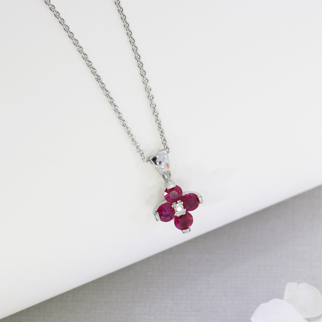 18ct White Gold Claw Set Pendant with Four Round Rubies in a Flower Shape
