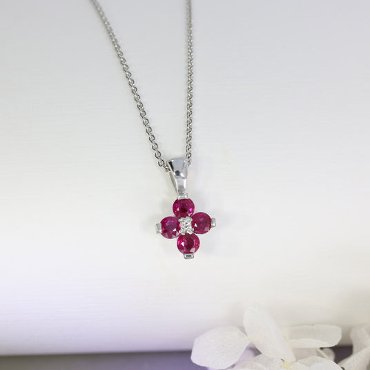 18ct White Gold Claw Set Pendant with Four Round Rubies in a Flower Shape